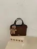 Bolsa Saco Transfronteiriça 2026 Nova Simples Moda para Mulheres Grande Capacidade Ombro Transversal Tendência