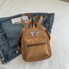 Mochila con lazo para mujer, diseño de nicho, estilo coreano, mochila escolar de moda, ligera, pequeña, para viaje, otoño e invierno, 2024