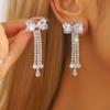 Pendientes de lujo europeos y americanos con diseño de nicho de flores de copo de nieve y diamantes de imitación superbrillantes, pendientes de circonita con temperamento femenino de alta gama