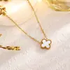 Acero de titanio doble cara trébol de cuatro hojas collar, pulsera, pendientes de lujo ligero, cadena para clavícula simple de acero de titanio que no se decolora fabricante