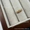 Botón de metal con logo de letra de tira larga ovalada, botón de aleación para coser a mano, botones de estilo pequeño y fragante para abrigos, camisas, accesorios de ropa