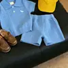 Conjunto de Verano para Niños 2026 Nuevo de Moda Tejido Cuello Polo Manga Corta Pantalones Cortos Conjunto de Dos Piezas para Bebés Niños con Estilo