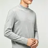 Camiseta de manga larga minimalista de algodón puro, estilo americano de marca moderna, para hombre, color negro, cuello semi-alto, camiseta básica moderna y versátil