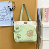 Bolso tote nuevo para estudiantes, gran capacidad, perfecto para sesiones de tutoría, diseño moderno color-blocking, patrón de dibujos animados lindo, gran capacidad, adecuado para ir al trabajo y llevar libros