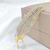 Broche de plumas de lujo sensación de alto nivel temperamento corsage versátil pasador anti-luz joyería para chal broche exquisito elegante
