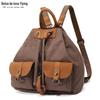 Mochila feminina casual mochila de lona impermeável com bolsa de mão de couro de primeira camada pequena cor sólida fornecimento de fabricantes