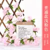 Suministro flor de cerezo ratán planta artificial flor Enredadera decoración de boda interior hogar cifrado flor falsa enredadera de flor de cerezo artificial