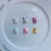 Serie de bolsos de dibujos animados brillantes nueva resina DIY joyería funda para teléfono móvil accesorios de gel de crema accesorios para el cabello hechos a mano al por mayor
