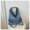 2026 Nuevo Bolso de Mezclilla Mate Vintage Deshilachado Lavado Bordado con Letras de Gran Capacidad para un Solo Hombro o Doble Hombro para Mujer