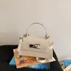 Diseño de Nicho Exquisito de Alta Gama Transfronterizo Nuevo Bolso Cuadrado Pequeño de Hombro Cruzado Simple y Elegante para Mujer Primavera/Verano 2026