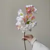 Amazon Cross-Border Ramo de Flor de Pessegueiro Artificial Flor de Seda Artificial de Haste Única Decoração para Sala de Estar Flor Falsa Ramo de Flor de Ameixeira Flor de Cerejeira de Chão