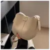 Bolsa pequena versátil transfronteiriça feminina Nova Coleção Primavera/Verão 2026 bolsa de ombro único transversal estilosa bolsa de balde retrô para trabalho/passeio bolsa para mãe e filho