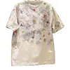 Moda Transfronteriza Estampada Cuello Redondo Verano 2026 Nuevo Estilo Manga Corta Lujo Ligero Marca de Moda Popular Camiseta Holgada Media Manga para Hombre Venta al por Mayor