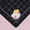 Accesorios de resina de Hello Kitty con lazo de cuadros multicolor en color rubor, pegamento en crema, gomas para el cabello, materiales para manualidades, fundas para teléfono y zuecos