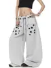Directo del fabricante: Pantalones de chándal estilo americano, diseño reversible, estampado de estrellas, pierna curva, unisex, corte holgado, pierna ancha para danza jazz