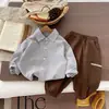 Conjunto de primavera para meninos 2026 novo estilo colete suéter de cachorrinho camisa xadrez calça lanterna conjunto de três peças para meninos