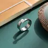 Hermoso simple nuevo estilo chino personalidad simple manxia imitación perla de agua dulce plateado incrustado anillo abierto al por mayor