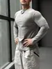 Camiseta Casual Americana de Color Puro con Cuello Redondo y Mangas Largas Elástica de Secado Rápido Deportiva Grande Transpirable Top Base para Entrenamiento Deportivo