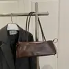 Bolsa Texturizada para Mulheres 2026 Primavera Novo Estilo Bolsa de Ombro para o Dia a Dia Moda Simples Laço Bolsa de Ombro para Mulheres