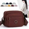2026 Nova Bolsa Feminina de Cor Sólida Tendência Moda Cor Sólida Ombro Único Transversal Simples Bolsa Feminina de Nylon Casual Pequena Quadrada