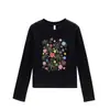 Camiseta negra de mujer con cuello redondo, hombros normales, manga larga, nuevo estilo primavera y otoño, estampado de flores de dibujos animados, corte ajustado, top moderno y versátil