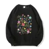 Moletom branco de gola redonda, forrado com fleece e espessado para mulheres, apresentando um novo design outono/inverno com um estilo casual, de caimento solto e uma estampa floral de desenho animado.