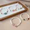 Pulsera elegante de doble círculo de jade y cristal de perla de marea nacional, pulsera de personalidad de nicho, pulsera de moda de alta sensación, venta al por mayor para mujeres
