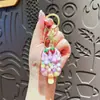 Chaveiro Criativo de Morango com Bolhas de Gelo e Areia Movediça em Garrafa Cor de Macaron Desenho Animado Fofo Pingente para Bolsa de Menina