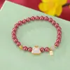 Yilu Plata de Ley S925 Chapado en Oro Arena Imperial Jade Hetian Cuentas Redondas Benmingnian Marca Shebaofu Pulsera Elegante