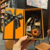 Miu Anillo de Llavero de Pan con Agua Alcalina Resina Pan Colgante de Llavero de Bolsa de Chocolate Regalo de Graduación