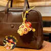 Chapéu do Deus da Riqueza de Ano Novo Desenho Animado Brinquedo de Apertar para Alívio de Estresse Chaveiro Pingente para Bolsa de Casal Chaveiro Presente do Ano do Cavalo Venda por Atacado