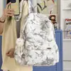 Mochila nueva estilo japonés con color degradado para estudiantes de secundaria femeninas, simple y elegante, gran capacidad, adecuada para estudiantes de preparatoria y universidad