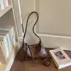 2026 Nova Moda Coreana Retrô Nicho Estilo Maillard Bolsa de Axila Grande Capacidade Bolsa de Ombro Único Transversal