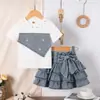 Conjunto de verano para niñas transfronterizo: nueva camiseta de retazos con pedrería brillante + falda vaquera abullonada con corbatín, elegante y con estilo, en stock