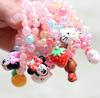 Novos fabricantes de pulseiras de desenho animado com pingente de gota de óleo de cristal de flor de pedra colorida infantil vendem acessórios de pulseira