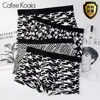 Artículos genuinos ropa interior para hombre calzoncillos para hombre calzoncillos antibacterianos pantalones cortos de color liso pantalones transfronterizos cabeza fabricantes serie 4410