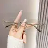 Gafas de Sol sin Marco Estilo Europeo y Americano Versátiles Ojo de Gato Moda Y2K Tendencia Influencer Estilo Callejero Gafas de Sol Parasol para Mujer