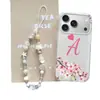 Aplicable a Apple 17ProMax Funda de Pulsera para Teléfono iPhone16Pro Femenina 15 Moderna 14Pro Rojo Melocotón Melocotón