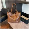 Bolsa Tote de Moda Transfronteiriça para Mulheres 2026 Nova Bolsa de Ombro de Grande Capacidade Bolsa de Mão Retro para o Dia a Dia Bolsa de Ombro