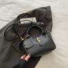 Bolso de Cubo Portátil Nicho Estilo Coreano para Mujer 2025 Nueva Moda Versátil Bolso de Hombro Simple Casual Bandolera