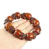 Pulsera de Cera de Abeja Ámbar de Segunda Generación Venta al por Mayor de Fábrica Ámbar Sangre Ámbar Flor Ámbar Medicina Pulsera de Cera Vieja Fluorescente Flotante Agua Salada