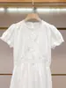 Vestido de Verano Nuevo de Alta Gama para Mujer de Shenzhen Estilo Casual Elegante Francés Bordado Hueco Blanco Manga Corta