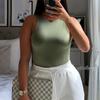 2024 Ropa de mujer estilo europeo y americano ins monocromática sexy de un hombro sin mangas mono leggings básicos