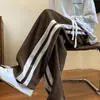 Calça masculina de veludo cotelê para primavera e outono, moderna e versátil, corte reto, modelagem solta, marca da moda, fluida, casual e estilosa