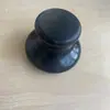 Fornecer pedra negra cabeça de cogumelo salão de beleza facial massageador de olhos raspador cabeça SPA pedra de energia
