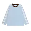 Camiseta de algodón puro de 220 g, moderna y versátil, con cuello redondo de color contrastante y rayas combinadas, camiseta de manga larga de corte holgado para venta al por mayor