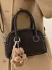 Bolsa de Bolos Portátil para Mujer 2025 Invierno Nueva Moda Retro Bolsa Almohada Viajero de Alto Valor Bolsa Individual