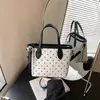 Bolso de Mano Retro para Mujer 2026 Nueva Moda de Otoño Nicho Súper Popular Bolso de Hombro para el Trabajo Bolso Cruzado Tipo Cubo