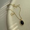 Collar con colgante de ónix negro retro de fritillaria blanca natural Yuanyou, estilo europeo y americano, cadena de lana superpuesta que combina con todo, sentido de alta gama para mujer