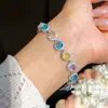 ¡Mar de Glamour en tu Muñeca! Pulsera de lazo ovalado de circón europeo y americano, sensación de lujo ligero y alta gama, joyería de nicho de moda
